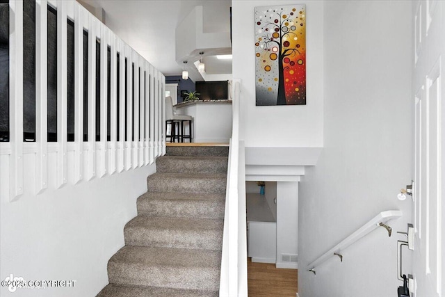 8968 Little Brook St, Anchorage, AK 99507 - stairway with wood finished floors