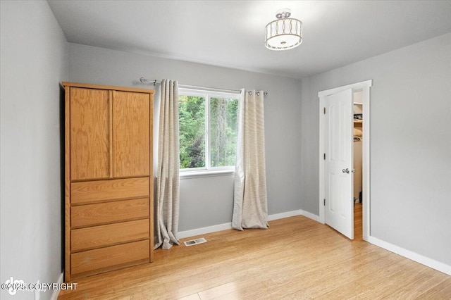 8968 Little Brook St, Anchorage, AK 99507 - unfurnished room featuring light wood-type flooring and baseboards
