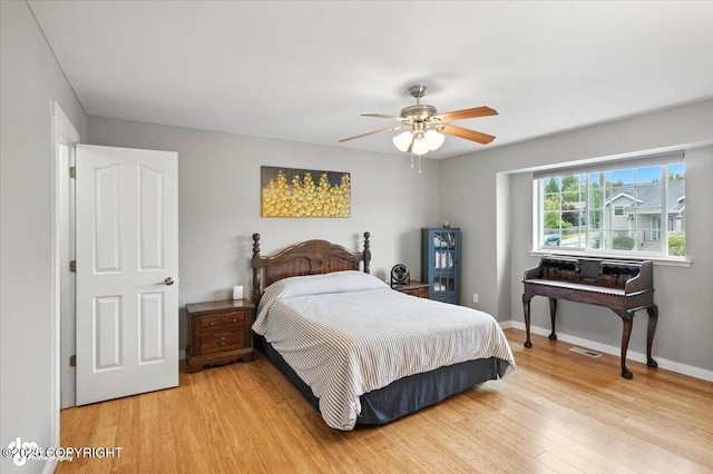 8968 Little Brook St, Anchorage, AK 99507 - bedroom featuring light wood-type flooring and a ceiling fan