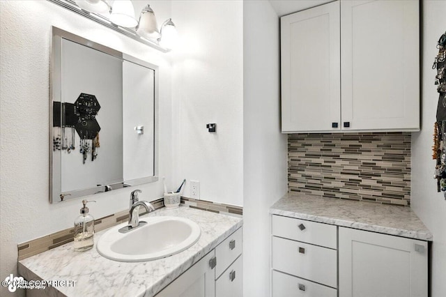 8968 Little Brook St, Anchorage, AK 99507 - bathroom with tasteful backsplash and vanity