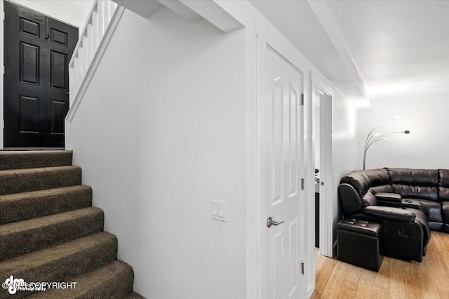 8968 Little Brook St, Anchorage, AK 99507 - staircase featuring wood finished floors