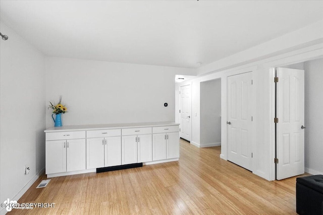 8968 Little Brook St, Anchorage, AK 99507 - unfurnished bedroom featuring light wood-style flooring