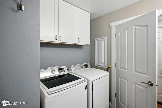 8968 Little Brook St, Anchorage, AK 99507 - washroom featuring washing machine and dryer and cabinet space