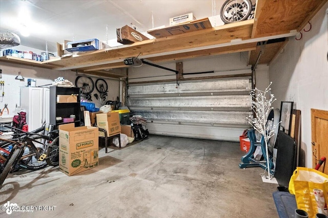 8968 Little Brook St, Anchorage, AK 99507 - garage featuring a garage door opener