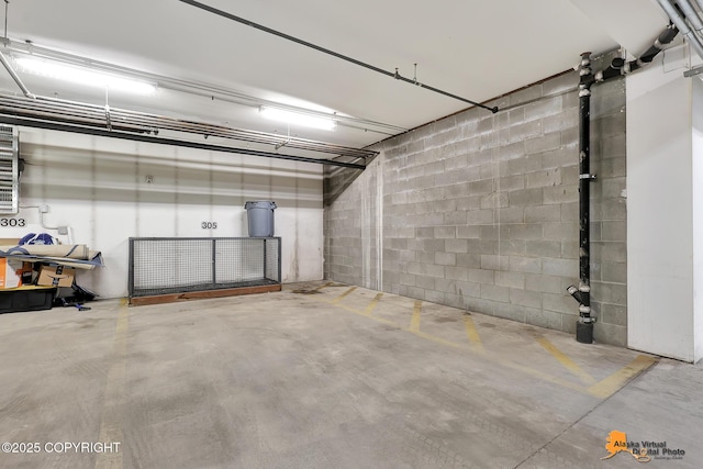 6942 Meadow St # 2-305, Anchorage, AK 99507 - parking garage with concrete block wall