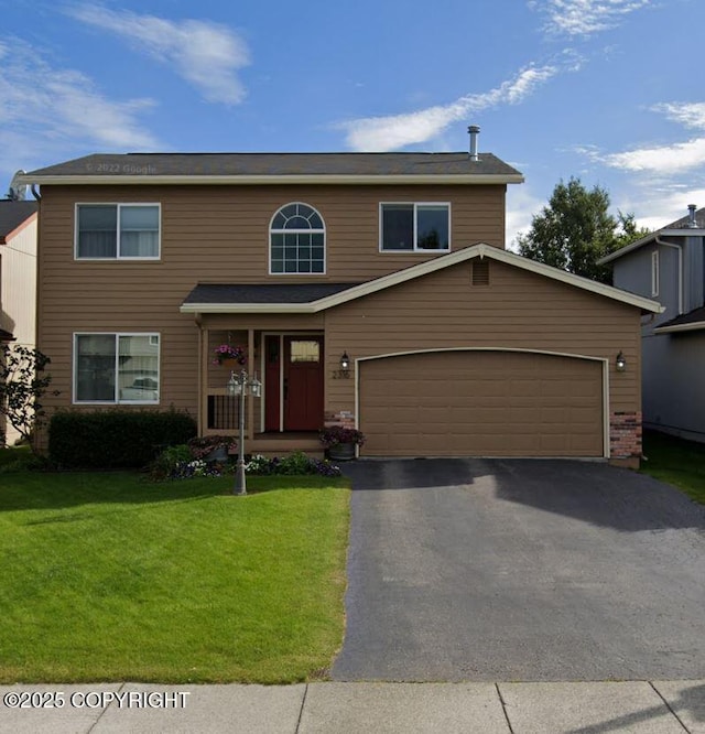 2316 Casey Cusack Loop, Anchorage, AK 99515 - traditional-style house with a front lawn, asphalt driveway, and a garage
