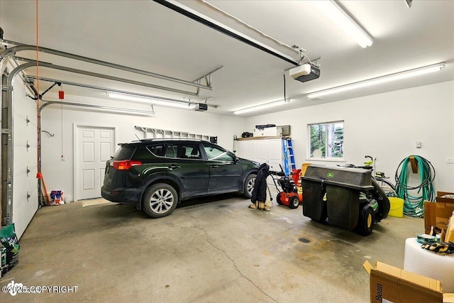 48585 Runners Ave, Soldotna, AK 99669 - garage with a garage door opener