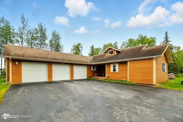 48585 Runners Ave, Soldotna, AK 99669 - view of front of house with an attached garage and driveway
