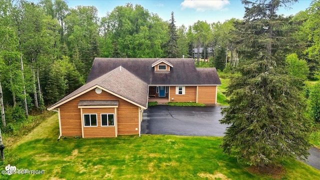48585 Runners Ave, Soldotna, AK 99669 - view of front of property with asphalt driveway, a front yard, and a wooded view