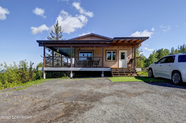 9291 Basher Dr, Anchorage, AK 99507 - view of front of property with a porch