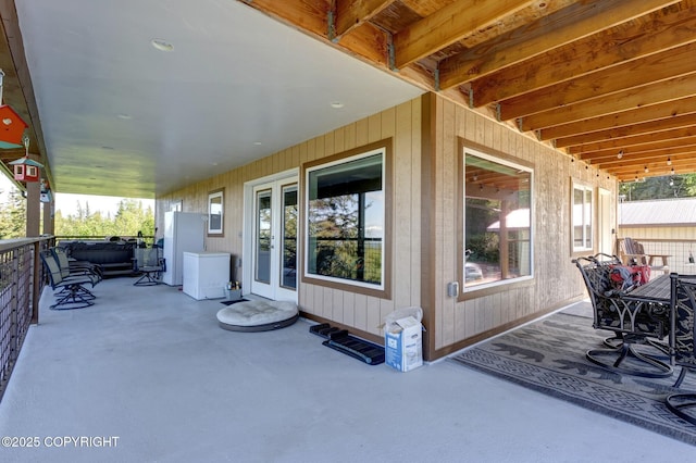 9291 Basher Dr, Anchorage, AK 99507 - view of patio / terrace featuring french doors