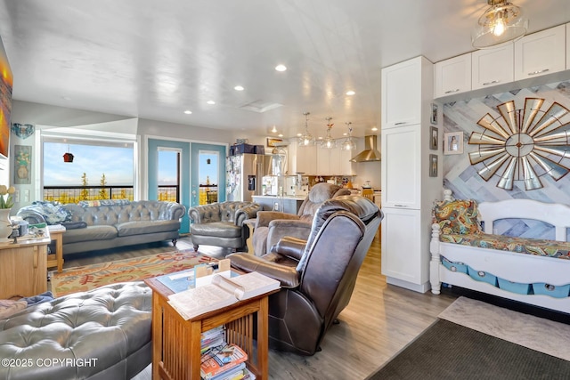 9291 Basher Dr, Anchorage, AK 99507 - living room featuring light wood-style floors and recessed lighting