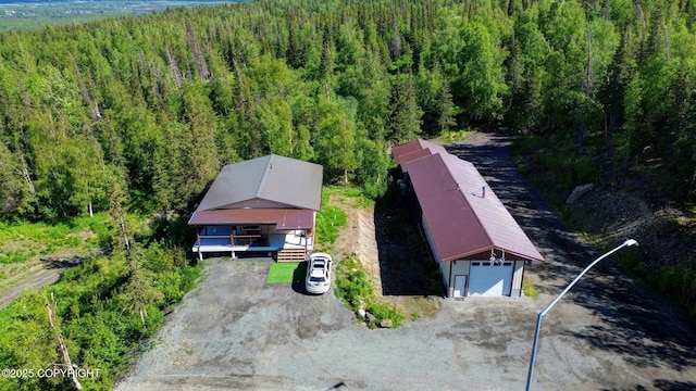 9291 Basher Dr, Anchorage, AK 99507 - view of subject property featuring a heavily wooded area