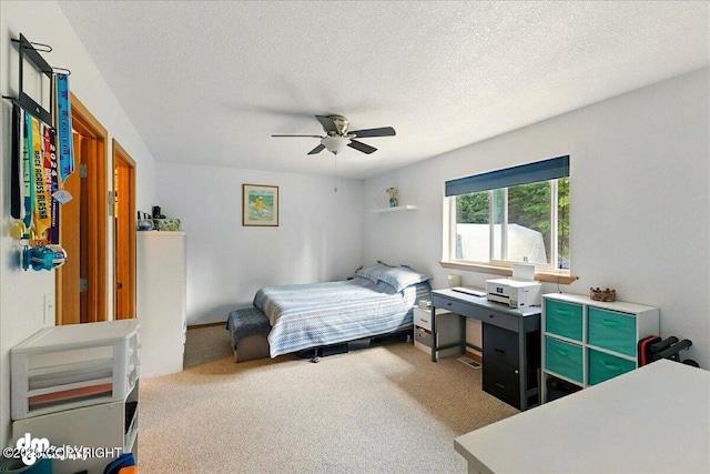 1213 Channel Way, Kenai, AK 99611 - carpeted bedroom with a textured ceiling and a ceiling fan