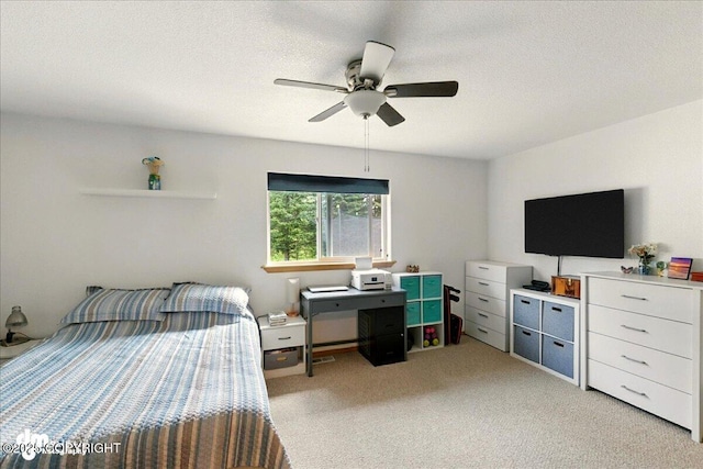1213 Channel Way, Kenai, AK 99611 - bedroom featuring light colored carpet, ceiling fan, and a textured ceiling