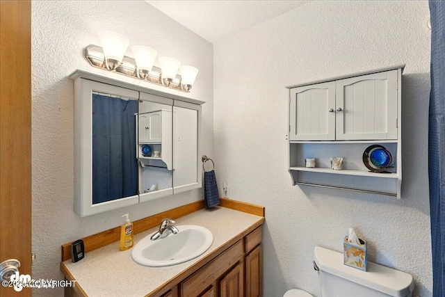 1213 Channel Way, Kenai, AK 99611 - bathroom with vanity and a textured wall