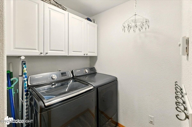1213 Channel Way, Kenai, AK 99611 - laundry room featuring separate washer and dryer and cabinet space
