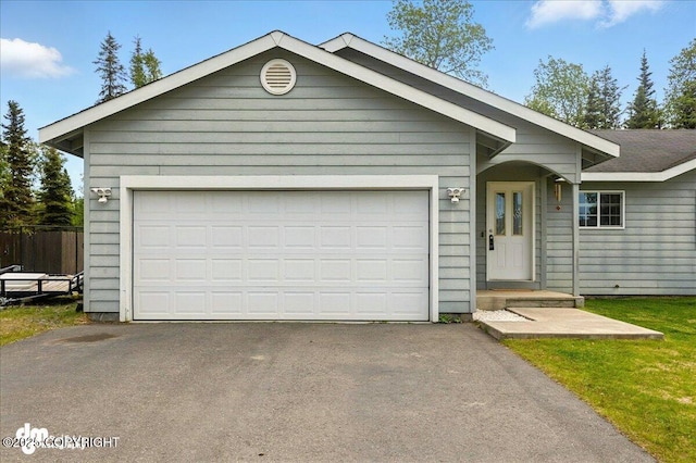 1213 Channel Way, Kenai, AK 99611 - ranch-style home with asphalt driveway and an attached garage