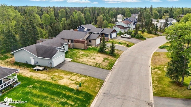 1213 Channel Way, Kenai, AK 99611 - aerial view of residential area featuring a forest