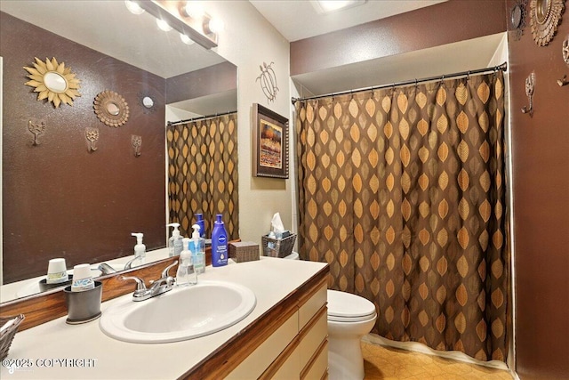 5420 E 112th Ave, Anchorage, AK 99516 - full bathroom featuring vanity, toilet, tile patterned flooring, and curtained shower