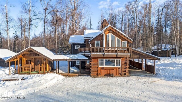 40327 S Malaspina Loop, Talkeetna, AK 99676 - view of front of property with a carport and log exterior