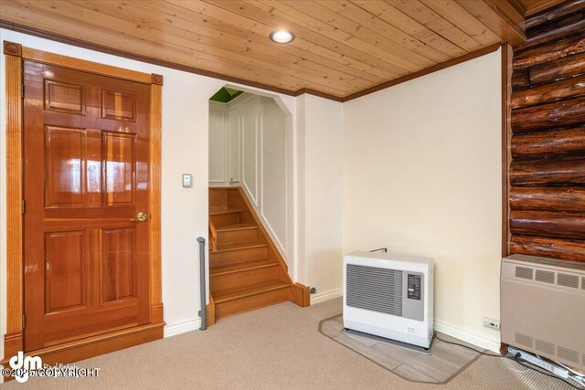 40327 S Malaspina Loop, Talkeetna, AK 99676 - basement featuring heating unit, wood ceiling, stairs, baseboards, and carpet floors