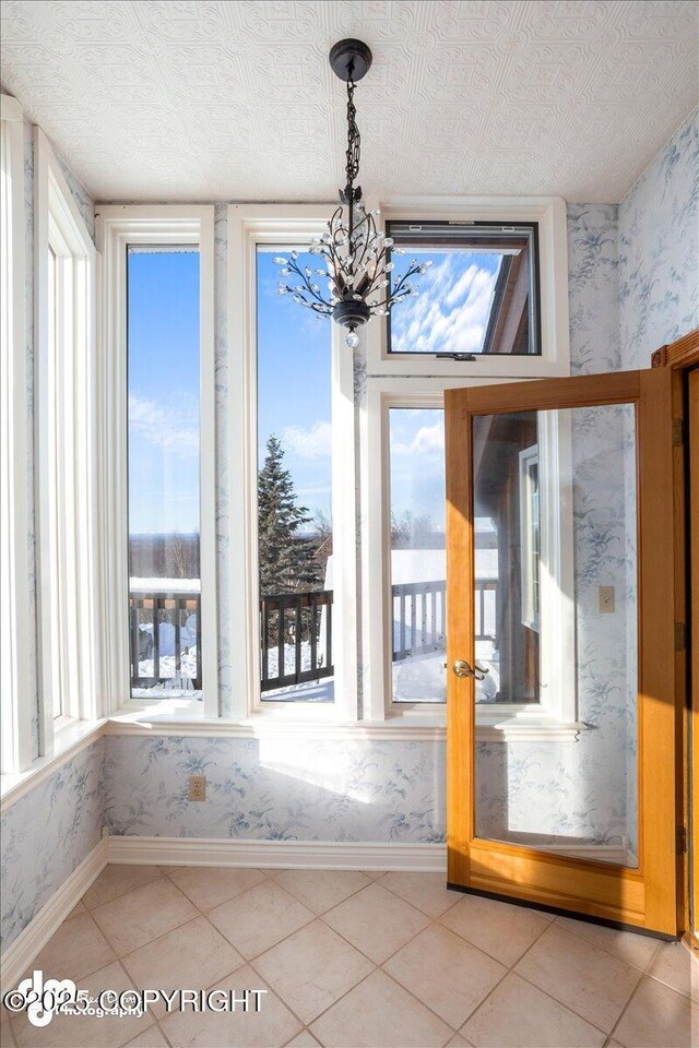 40327 S Malaspina Loop, Talkeetna, AK 99676 - unfurnished sunroom with a chandelier and healthy amount of natural light
