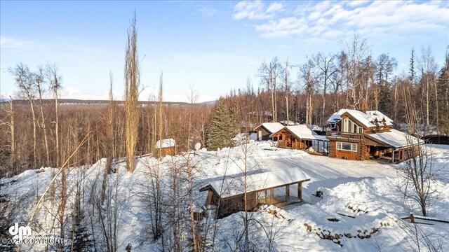 40327 S Malaspina Loop, Talkeetna, AK 99676 - yard layered in snow with a view of trees