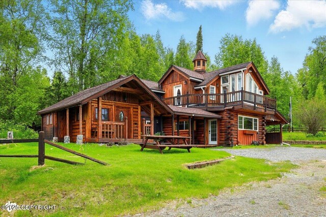 40327 S Malaspina Loop, Talkeetna, AK 99676 - rear view of house with a yard, a wooden deck, and log siding
