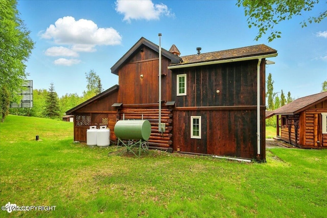 40327 S Malaspina Loop, Talkeetna, AK 99676 - back of property featuring heating fuel and a lawn