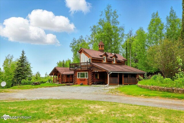 40327 S Malaspina Loop, Talkeetna, AK 99676 - log home with gravel driveway