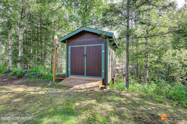 7408 N Grouse Loop, Wasilla, AK 99654 - view of shed with a forest view