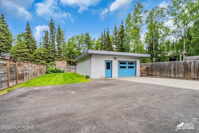 1601 Bannister Dr, Anchorage, AK 99508 - garage with asphalt driveway