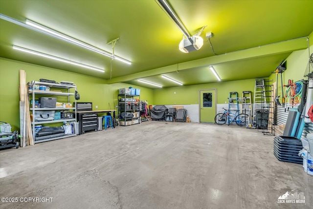 1601 Bannister Dr, Anchorage, AK 99508 - garage featuring a garage door opener