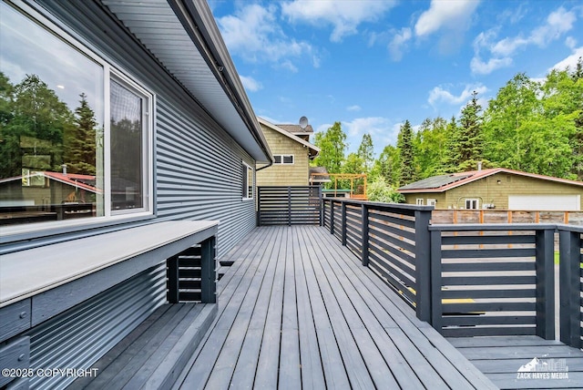 1601 Bannister Dr, Anchorage, AK 99508 - wooden terrace with view of scattered trees