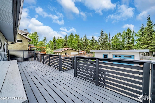 1601 Bannister Dr, Anchorage, AK 99508 - wooden deck featuring view of scattered trees