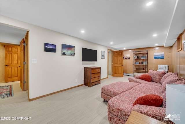 1601 Bannister Dr, Anchorage, AK 99508 - living room featuring a baseboard radiator, recessed lighting, baseboards, and light wood-style floors