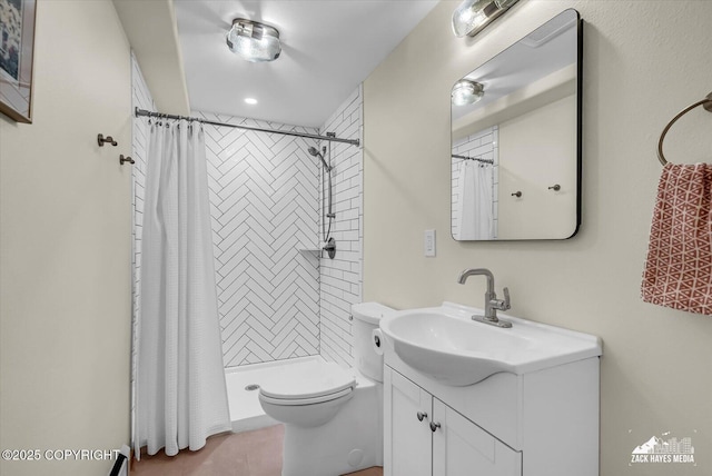 1601 Bannister Dr, Anchorage, AK 99508 - bathroom featuring vanity, toilet, and a tile shower