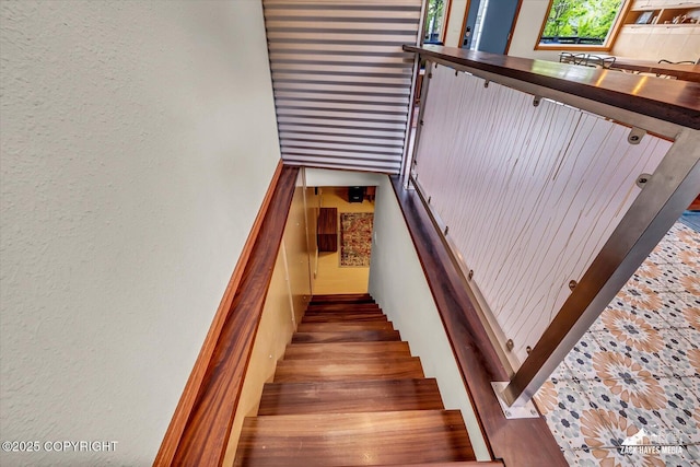 1601 Bannister Dr, Anchorage, AK 99508 - stairway featuring a textured wall
