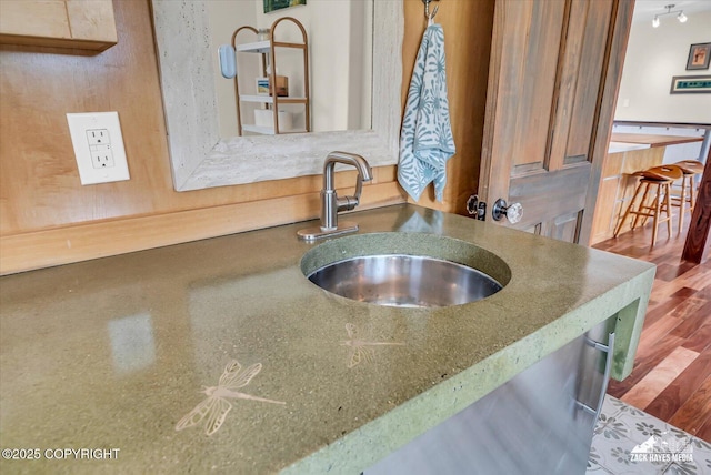 1601 Bannister Dr, Anchorage, AK 99508 - kitchen featuring a sink and wood finished floors