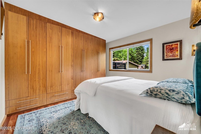 1601 Bannister Dr, Anchorage, AK 99508 - bedroom with wood finished floors