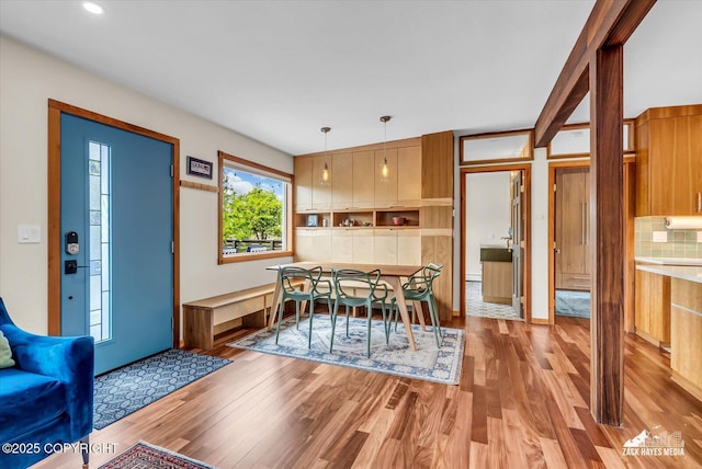 1601 Bannister Dr, Anchorage, AK 99508 - dining area with wood finished floors and recessed lighting