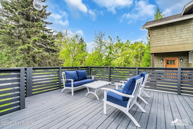 1601 Bannister Dr, Anchorage, AK 99508 - deck featuring an outdoor hangout area