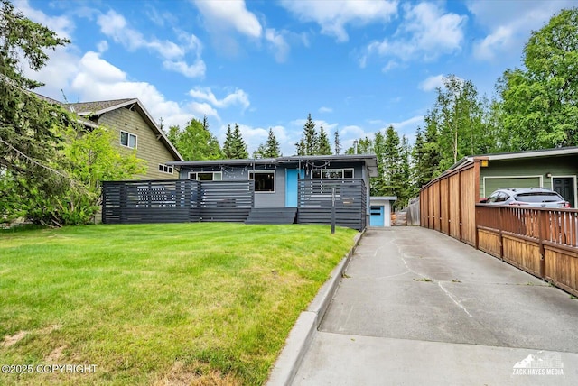 1601 Bannister Dr, Anchorage, AK 99508 - view of front facade with a front yard