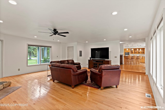 1701 Woo Blvd, Anchorage, AK 99515 - living area featuring a ceiling fan, light wood-style flooring, and recessed lighting