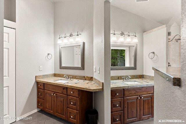 1701 Woo Blvd, Anchorage, AK 99515 - full bathroom featuring tile patterned flooring and two vanities