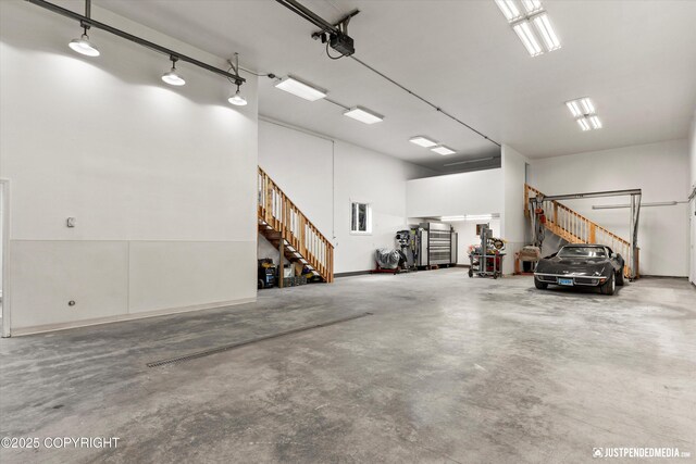 1701 Woo Blvd, Anchorage, AK 99515 - garage featuring a garage door opener