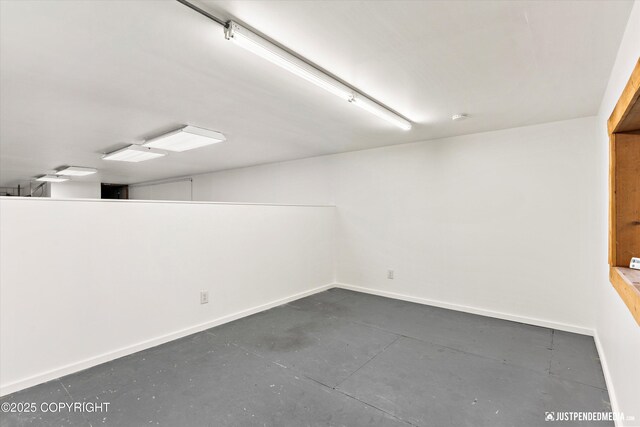 1701 Woo Blvd, Anchorage, AK 99515 - below grade area featuring baseboards