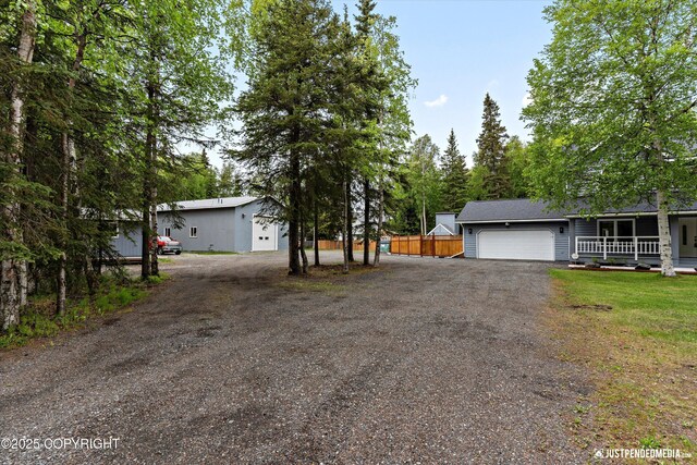 1701 Woo Blvd, Anchorage, AK 99515 - view of front of house featuring driveway and a garage