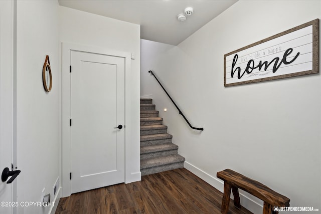 7864 Crane Cir, Anchorage, AK 99502 - stairway with wood finished floors and baseboards